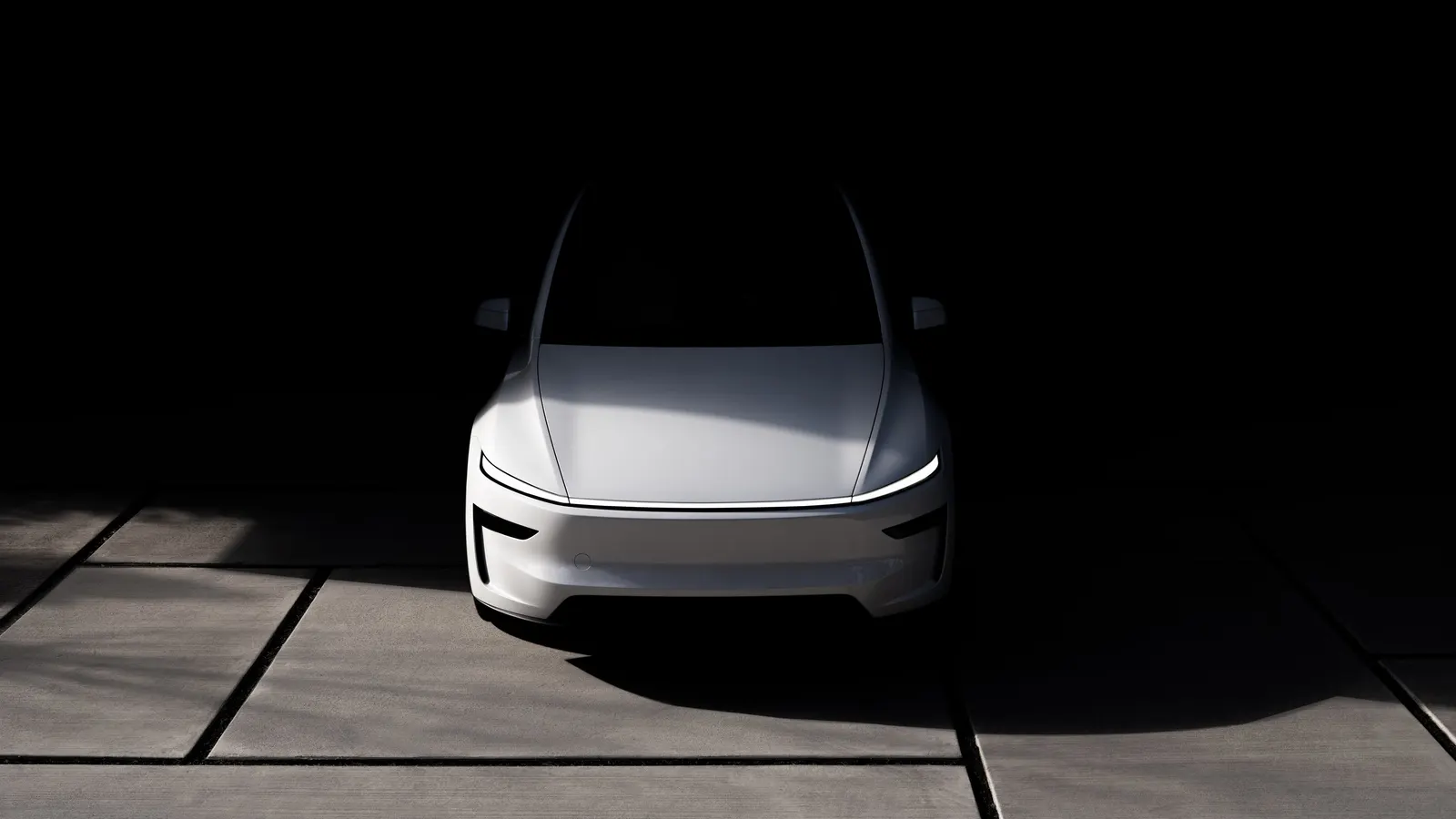 Tesla Model Y 官方照片呈現車尾與日本市場使用情境